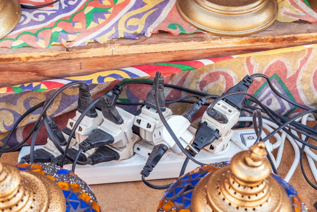 Extension cords overloading a power strip, a church fire hazard